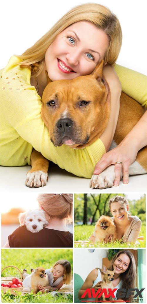 Young women with dogs stock photo