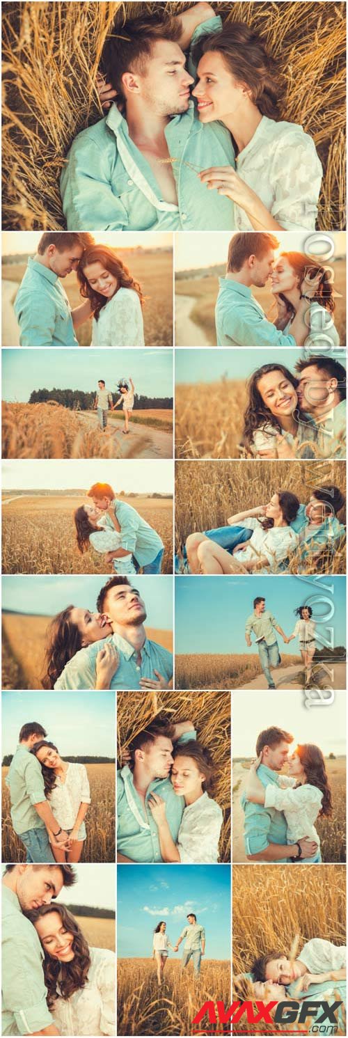 Romantic couple in wheat field stock photo