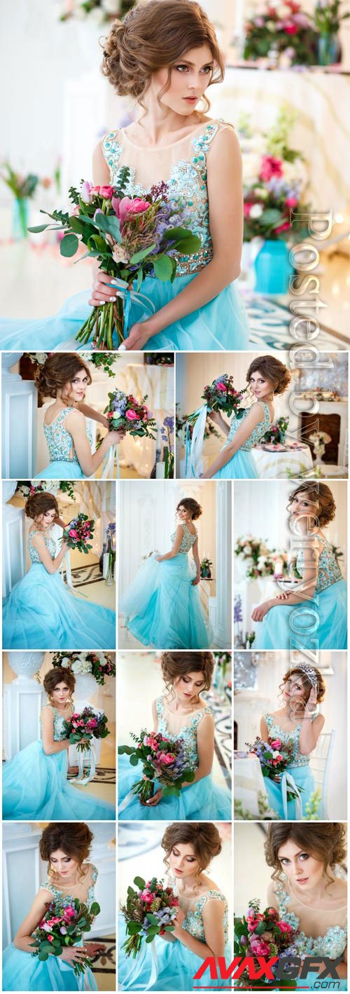 Girl in blue evening dress with flowers stock photo