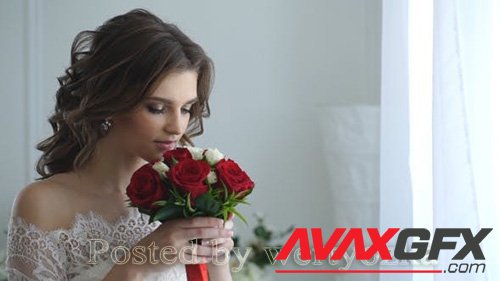 Videohive - Beautiful Bride Smelling Wedding Bouquet 18503999