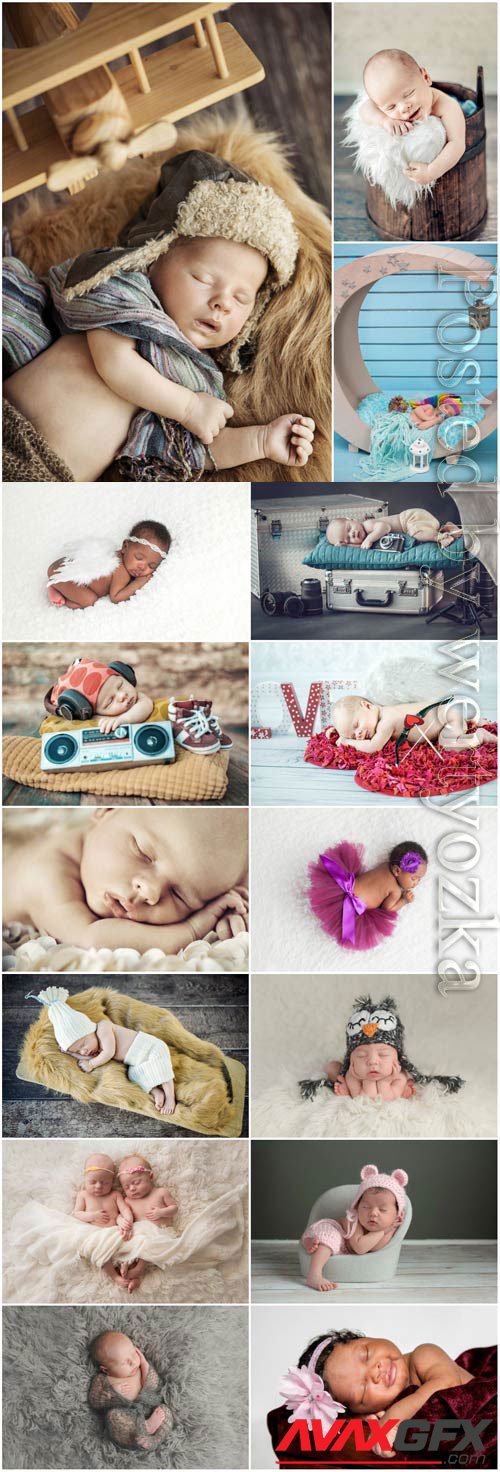 Sleeping newborn babies in the studio at a photo session stock photo