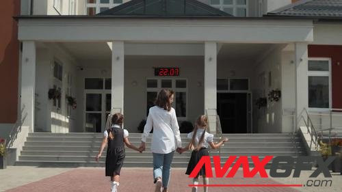 MotionArray – Mother Walking Kids To School 1004405