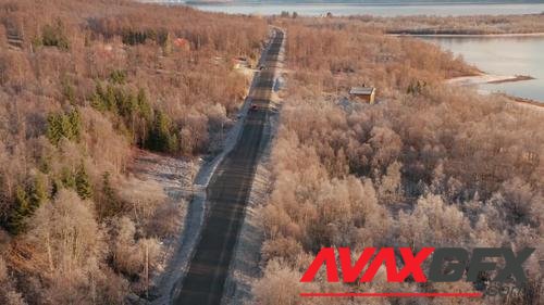 MotionArray – Drone Over Road Through Trees In Winter 994023