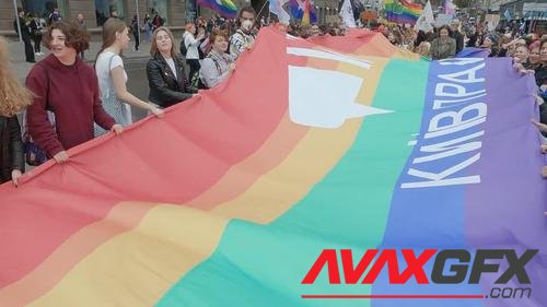 MotionArray – Demonstrators Waving Huge Pride Flag 1034532