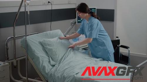 MotionArray – Nurse Making Bed In Hospital Ward 1046400