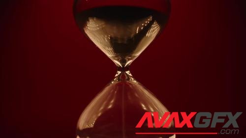 MotionArray – An Hourglass On A Red Background 1052112