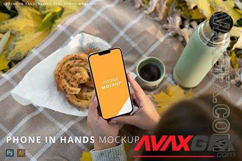 iPhone 13 Pro Max in Woman Hand Autumn Park Mockup Y9HTKRY