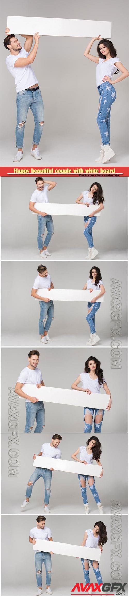 Young couple in jeans hold a white poster