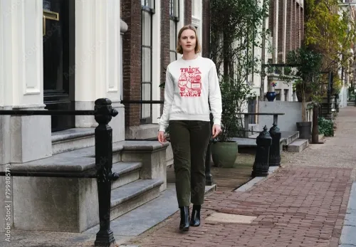 Mockup of woman in customizable sweatshirt outside building 799805713